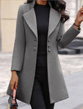 Manteau ajusté à boutons et coupe longue
